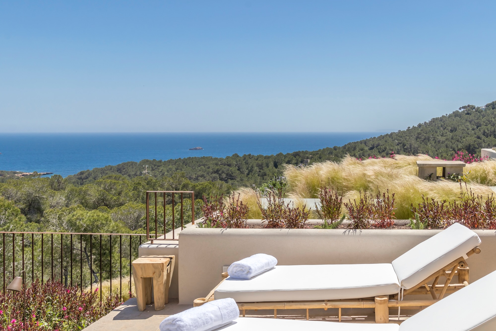 Bedroom terraces and poolside lounge areas