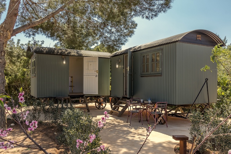 The ultimate shepherds' huts with air-conditioning, one is a double-bedroom, one is a bathroom