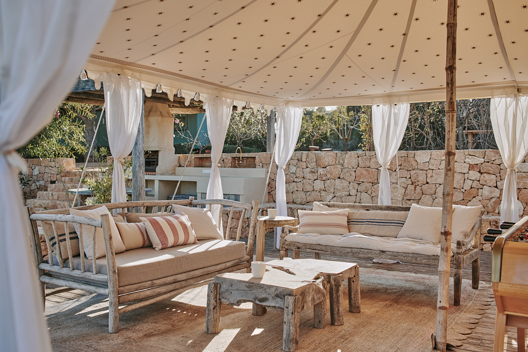 A tented area of shade near the pool for relaxed fun